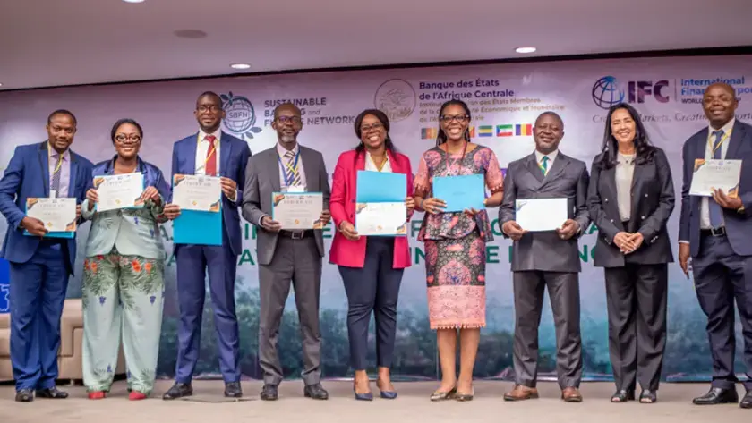 picture of pose with the Certificates of Completion