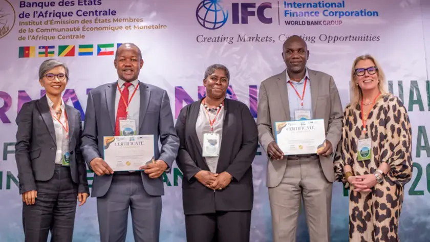 image of pose with the Certificates of Completion