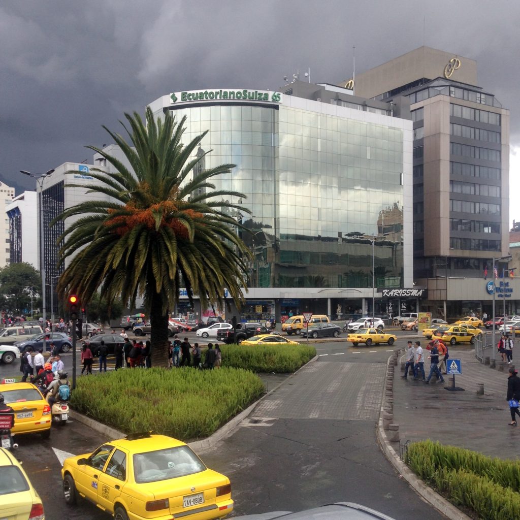 Taxis and commercial buidings in Ecuador